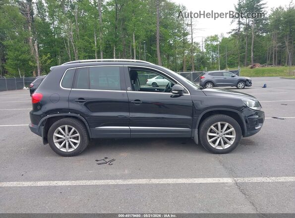 WVGSV7AX0HW508908 2017 VOLKSWAGEN TIGUAN Black Widok wnętrza z tyłu