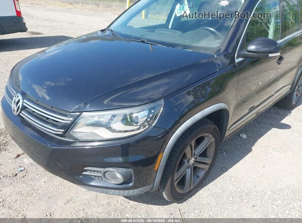 WVGTV7AX9HK015465 2017 VOLKSWAGEN TIGUAN Black Widok z przodu