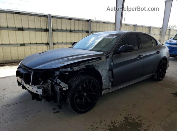 ZARFAMEV4K7599861 2019 ALFA ROMEO GIULIA Silver Vista tres cuartos delantera izquierda