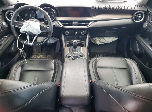 ZASPAKBN2K7C31225 2019 ALFA ROMEO STELVIO Tan Dashboard view