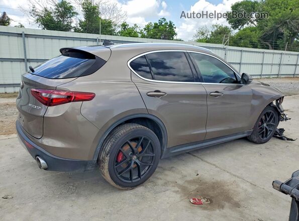 ZASPAKBN2K7C31225 2019 ALFA ROMEO STELVIO Tan Rear right