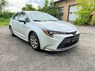 2024 Toyota Corolla Le White vin: JTDB4MEE9R3016346