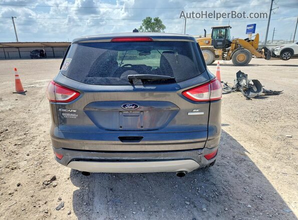 1FMCU0GX0GUC88007 2016 FORD ESCAPE Gray Vista trasera