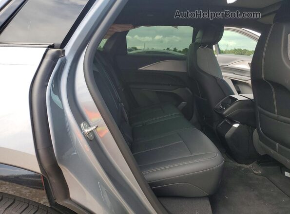 1GYKPMRKXRZ130838 2024 CADILLAC OTHER Silver Rear seats view