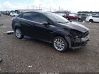 2018 Ford Fiesta Titanium Black vin: 3FADP4CJ4JM144020