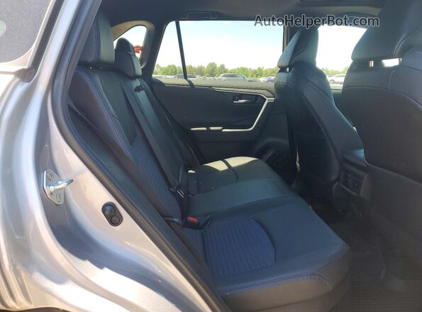 4T3E6RFV2NU098284 2022 TOYOTA RAV4 Silver Вид задньої частини салону