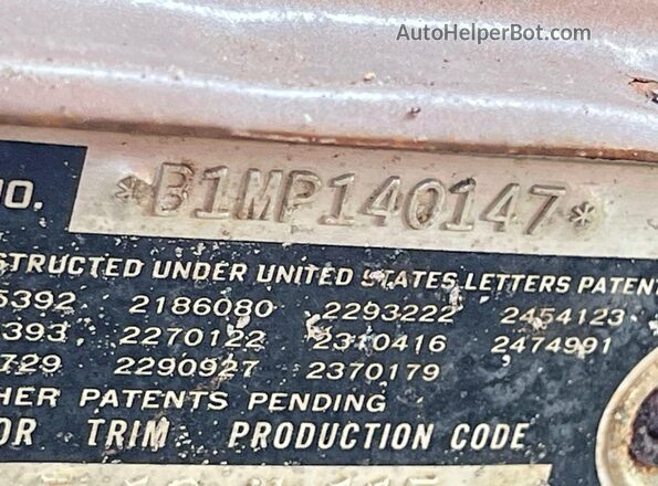 B1MP140147 1951 FORD CUSTOM Brown Rear interior view