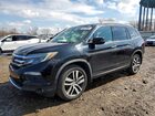 2018 Honda Pilot Touring Черный vin: 5FNYF6H95JB051326