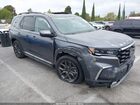 2023 Honda Pilot 2wd Touring Gray vin: 5FNYG2H76PB015268