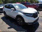 2018 Honda Cr-v Touring White vin: 5J6RW2H95JL024504