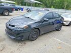 2018 Toyota Corolla Le Black vin: 5YFBURHE4JP833809