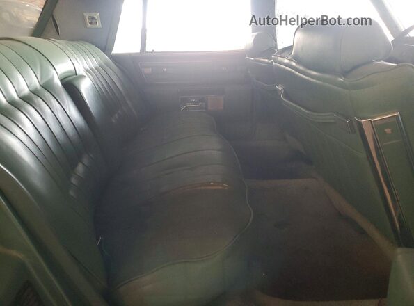 6D69S7Q312511 1977 CADILLAC DEVILLE Green Вид задніх сидінь