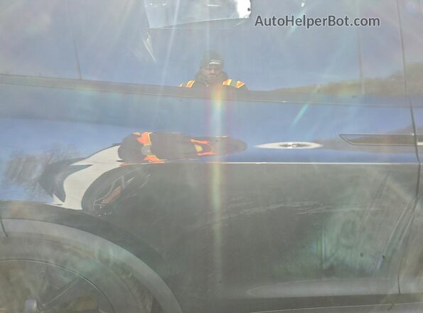 7SAXCBE60RF438677 2024 TESLA X Charcoal Вид задньої частини салону