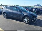2023 Tesla Model Y Awd/long Range Dual Motor All-wheel Drive Gray vin: 7SAYGAEE1PF791968