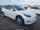 2024 Tesla Model Y Long Range Dual Motor All-wheel Drive White vin: 7SAYGAEE1RF030828