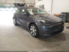 2023 Tesla Model Y Awd/long Range Dual Motor All-wheel Drive Gray vin: 7SAYGAEE4PF835123