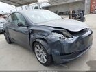 2023 Tesla Model Y Awd/long Range Dual Motor All-wheel Drive Gray vin: 7SAYGAEE5PF909942