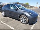 2023 Tesla Model Y Awd/long Range Dual Motor All-wheel Drive Gray vin: 7SAYGAEE5PF967503