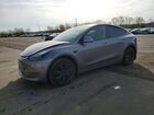 2024 Tesla Model Y Silver vin: 7SAYGAEE5RF171062