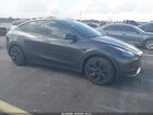 2025 Tesla Model Y Long Range Dual Motor All-wheel Drive Gray vin: 7SAYGAEE9SF221936