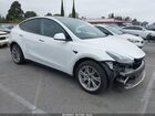 2023 Tesla Model Y Awd/long Range Dual Motor All-wheel Drive White vin: 7SAYGAEEXPF942015