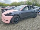 2024 Tesla Model Y Two Tone vin: 7SAYGAEEXRF020105