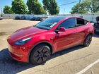 2024 Tesla Model  Y Red vin: 7SAYGAEEXRF181277
