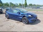 2024 Tesla Model Y Long Range Dual Motor All-wheel Drive Blue vin: 7SAYGAEEXRF206209