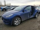 2024 Tesla Model Y Синий vin: 7SAYGAEEXRF982646