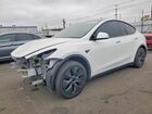 2025 Tesla Model Y White vin: 7SAYGDED0SF242568