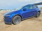 2026 Tesla Model Y Blue vin: 7SAYGDED0TF536764