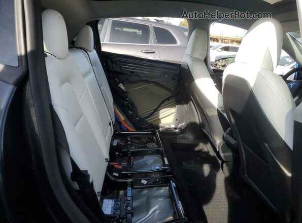 7SAYGDED4SA377758 2025 TESLA MODEL Charcoal Vista interior trasera