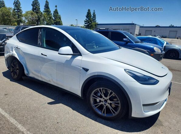 7SAYGDED6RF118878 2024 TESLA MODEL White Front right