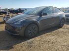 2024 Tesla Model Y Gray vin: 7SAYGDED8RF112774