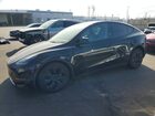 2024 Tesla Model Y Black vin: 7SAYGDED9RF120883