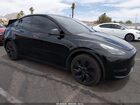 2025 Tesla Model Y Long Range Dual Motor Rear-wheel Drive Black vin: 7SAYGDED9SF313878