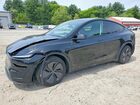 2026 Tesla Model Y Black vin: 7SAYGDEDXTA457678