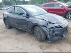 2026 Tesla Model Y Gray vin: 7SAYGDEDXTA590330