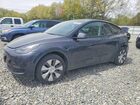 2024 Tesla Model Y Gray vin: 7SAYGDEE0RA226466