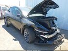2026 Tesla Model Y All-wheel Drive/long Range Launch Series/premium All-wheel Drive Black vin: 7SAYGDEE0TF641104