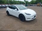 2023 Tesla Model Y Awd/long Range Dual Motor All-wheel Drive Белый vin: 7SAYGDEE1PF748183