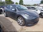 2023 Tesla Model Y Awd/long Range Dual Motor All-wheel Drive Gray vin: 7SAYGDEE1PF881154