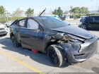 2024 Tesla Model Y Long Range Dual Motor All-wheel Drive Серый vin: 7SAYGDEE1RA233359