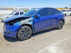 2024 Tesla Model Y Blue vin: 7SAYGDEE1RF197045