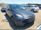 2025 Tesla Model Y Long Range Dual Motor All-wheel Drive Gray vin: 7SAYGDEE1SF318310