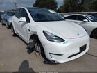 2023 Tesla Model Y Awd/long Range Dual Motor All-wheel Drive White vin: 7SAYGDEE2PA095683