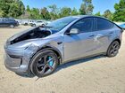 2026 Tesla Model Y Silver vin: 7SAYGDEE2TF326191