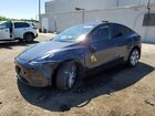 2024 Tesla Model Y Charcoal vin: 7SAYGDEE3RA277475