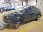 2026 Tesla Model Y Black vin: 7SAYGDEE3TA454873