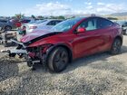 2026 Tesla Model Y Red vin: 7SAYGDEE3TF567533